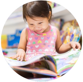 Preschool Girl reading a Book